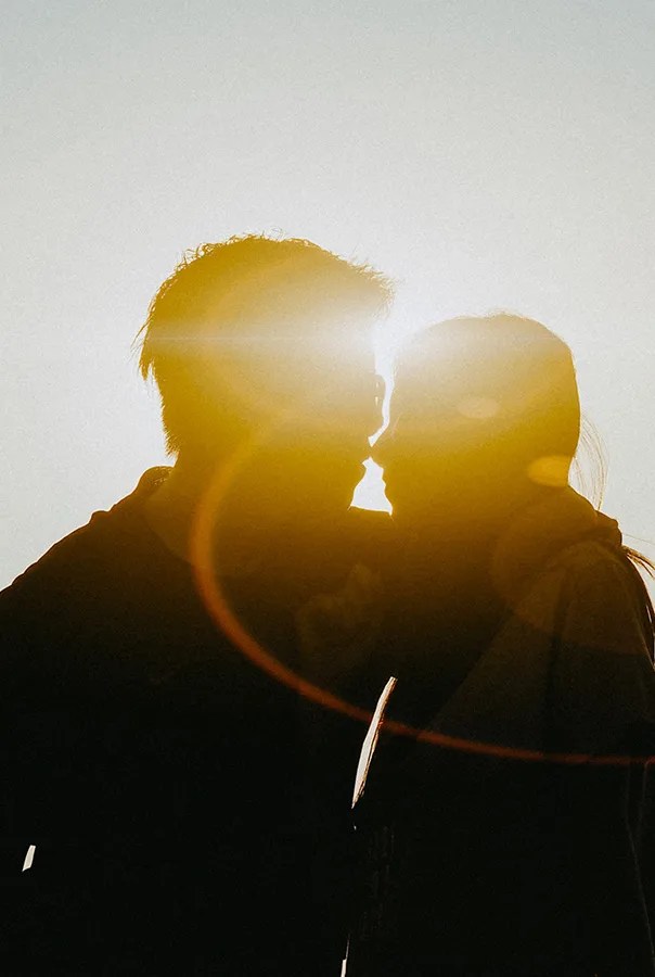 photo of two people in silhouette